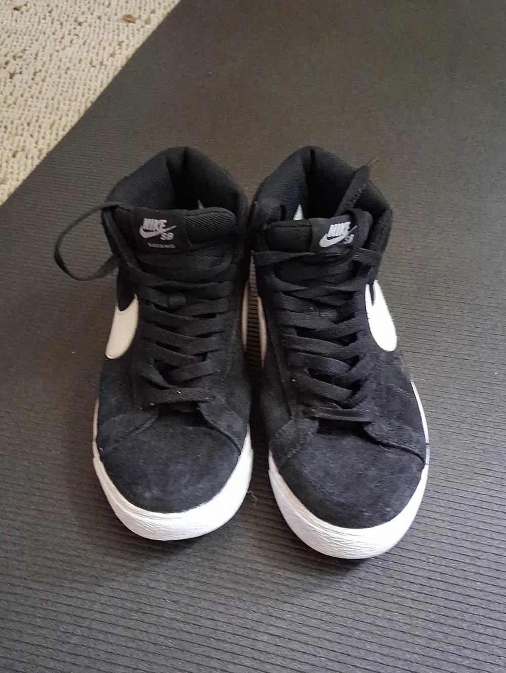 Nike Black Mid-Top Sneakers with White Swoosh